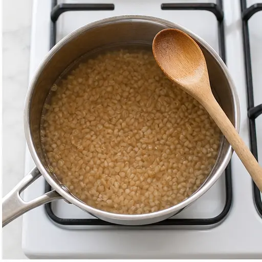 Step 2: Simmering farro in a saucepan until tender