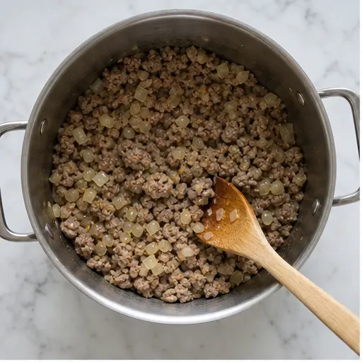Step 1: Browning Italian sausage and onion
