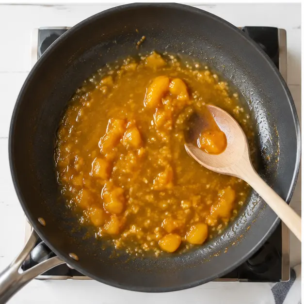 Step 3: Simmering the peach glaze