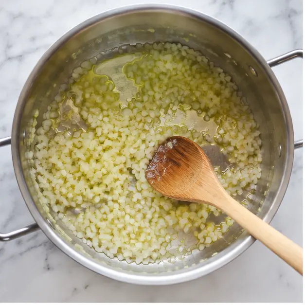 Step 1: Sautéing the onion in olive oil