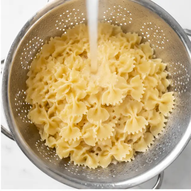 Step 2: Rinsing pasta under cold water