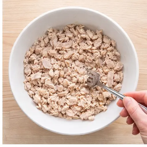 Step 2: Flake the tuna with a fork