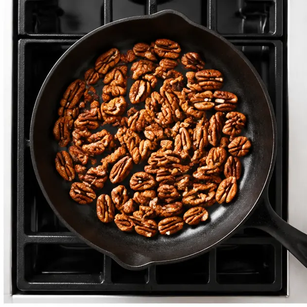 Step 2: Toast the pecans until golden and fragrant.