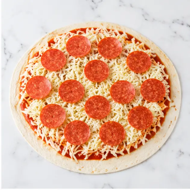 Step 2: Adding mozzarella cheese and pepperoni