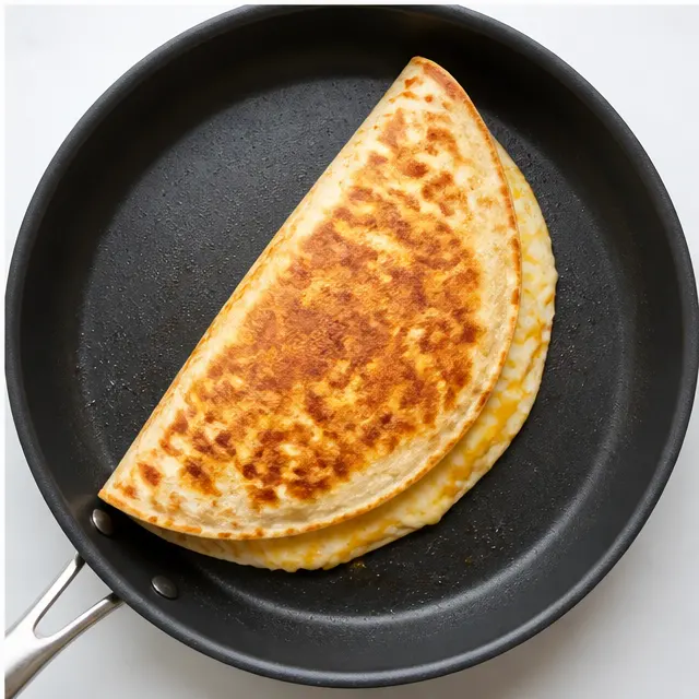 Step 4: Folding quesadillas until golden and crisp