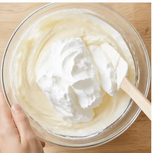 Step 3: Fold whipped cream into cream cheese filling
