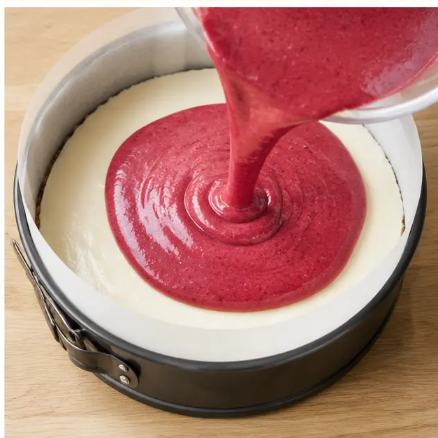 Step 4: Pour cranberry mousse over chilled cheesecake layer