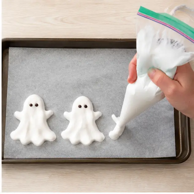 Step 2: Piping freeform ghost shapes onto parchment