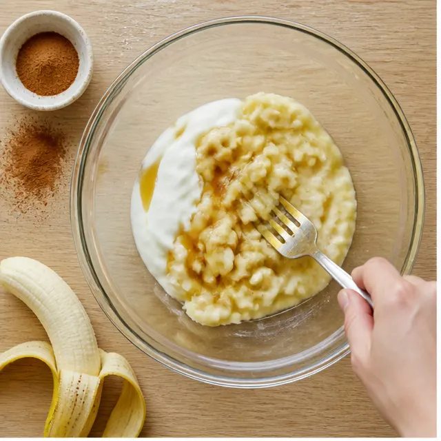 Mash the ripe banana with Greek yogurt and agave until smooth