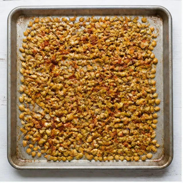 Step 1: Toasting the spiced pumpkin seeds on a baking sheet