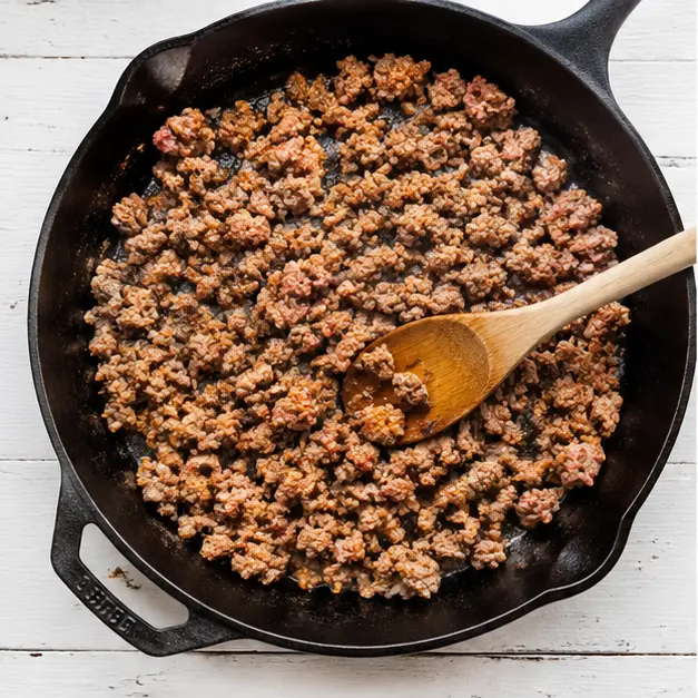 Step 1: brown the hot breakfast sausage in a large skillet until golden crumbles form