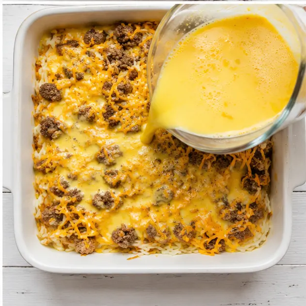 Step 4: whisk eggs and milk together, pour over the layered casserole, then bake until set and golden